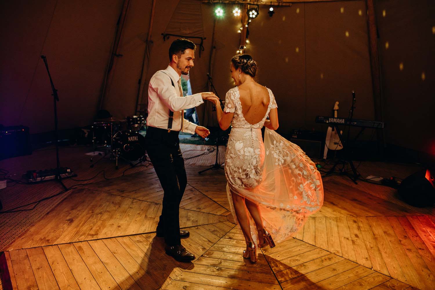 bride and groom first dance at Buckinghamshire tipi wedding