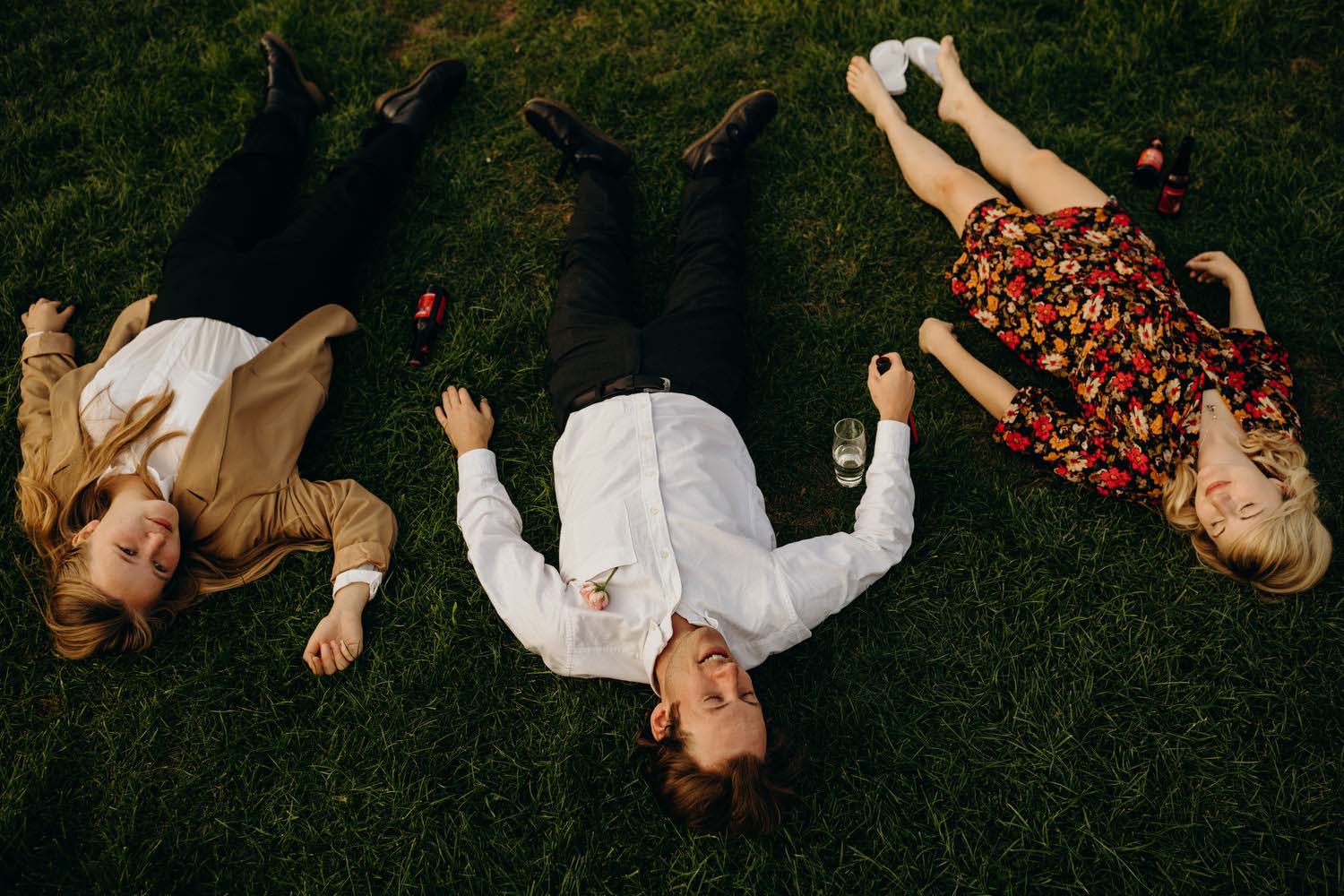 guests relax on lawn at wedding reception