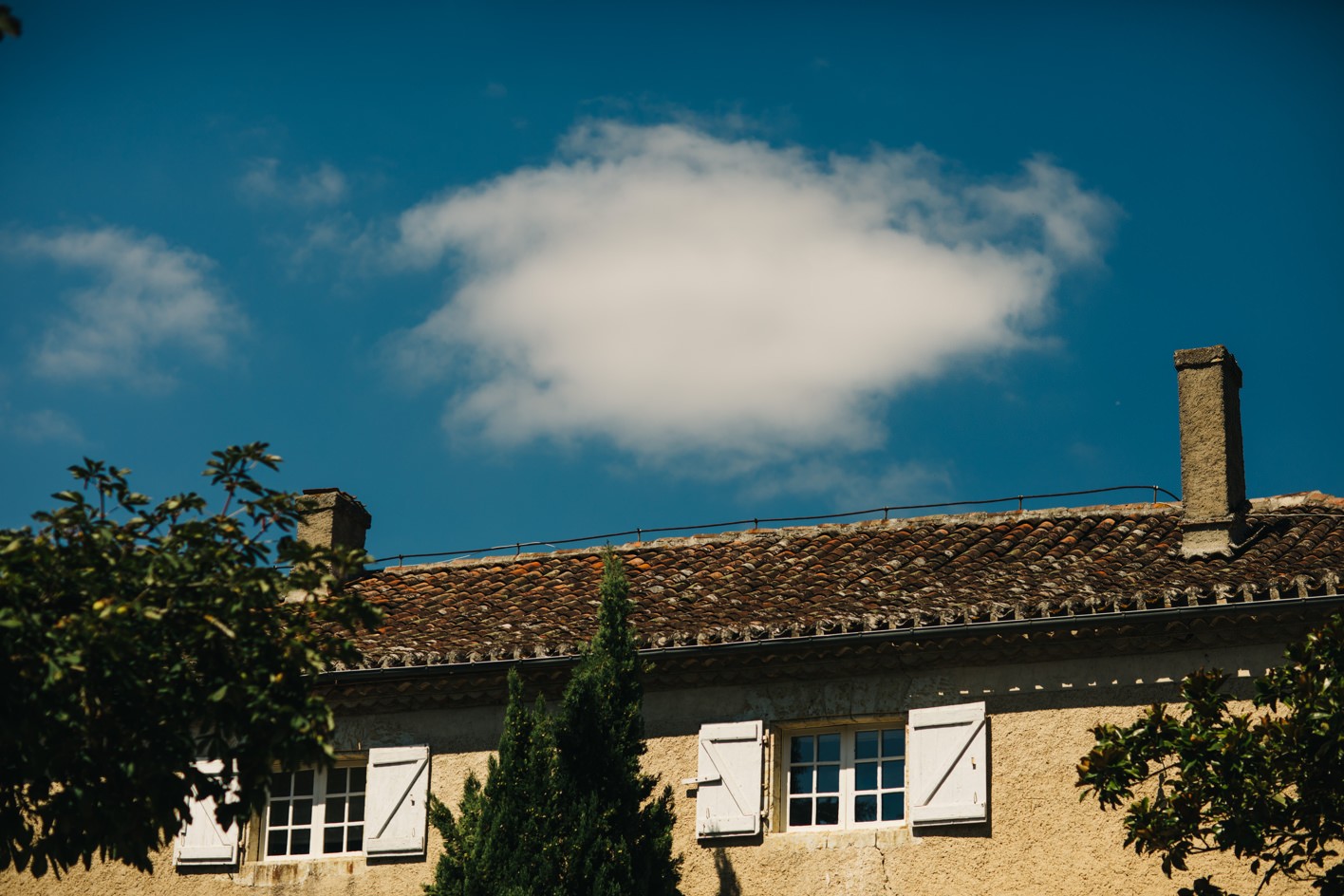 Chateau Lartigolle with single cloud in sky