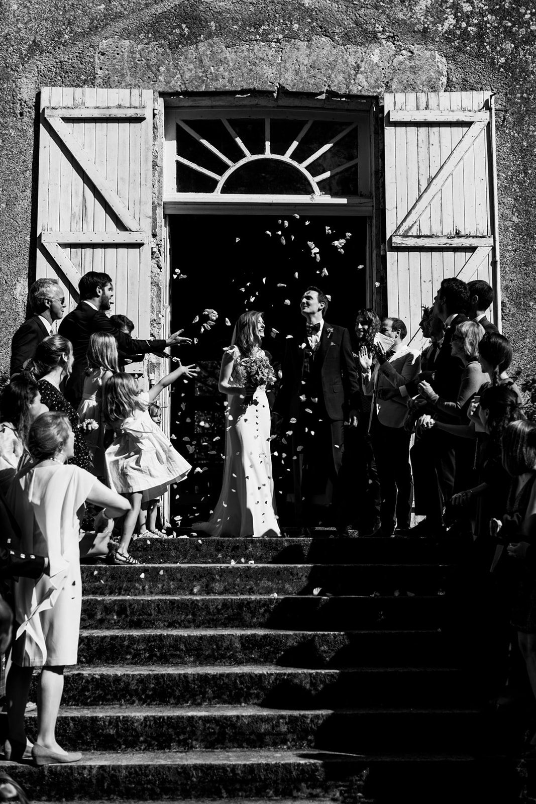Confetti photograph of bride and groom at Chateau Lartigolle