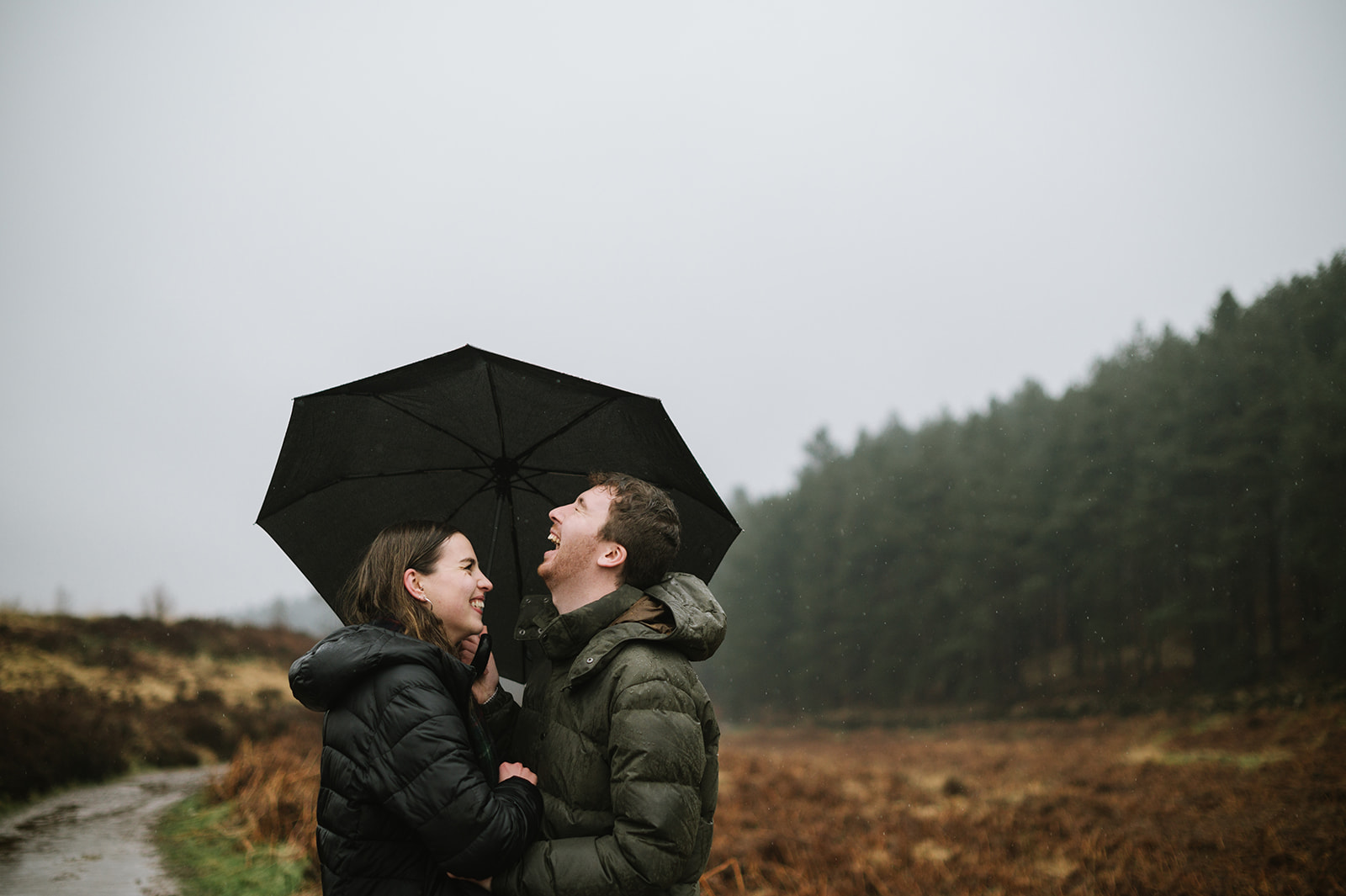 A rainy day engagement photo session on Cannock Chase