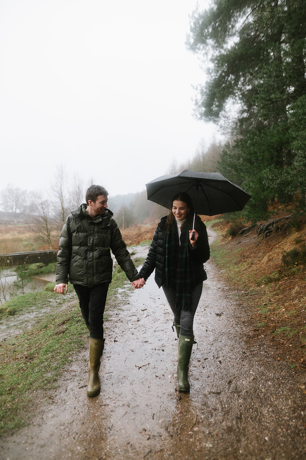 A rainy day engagement photo session on Cannock Chase