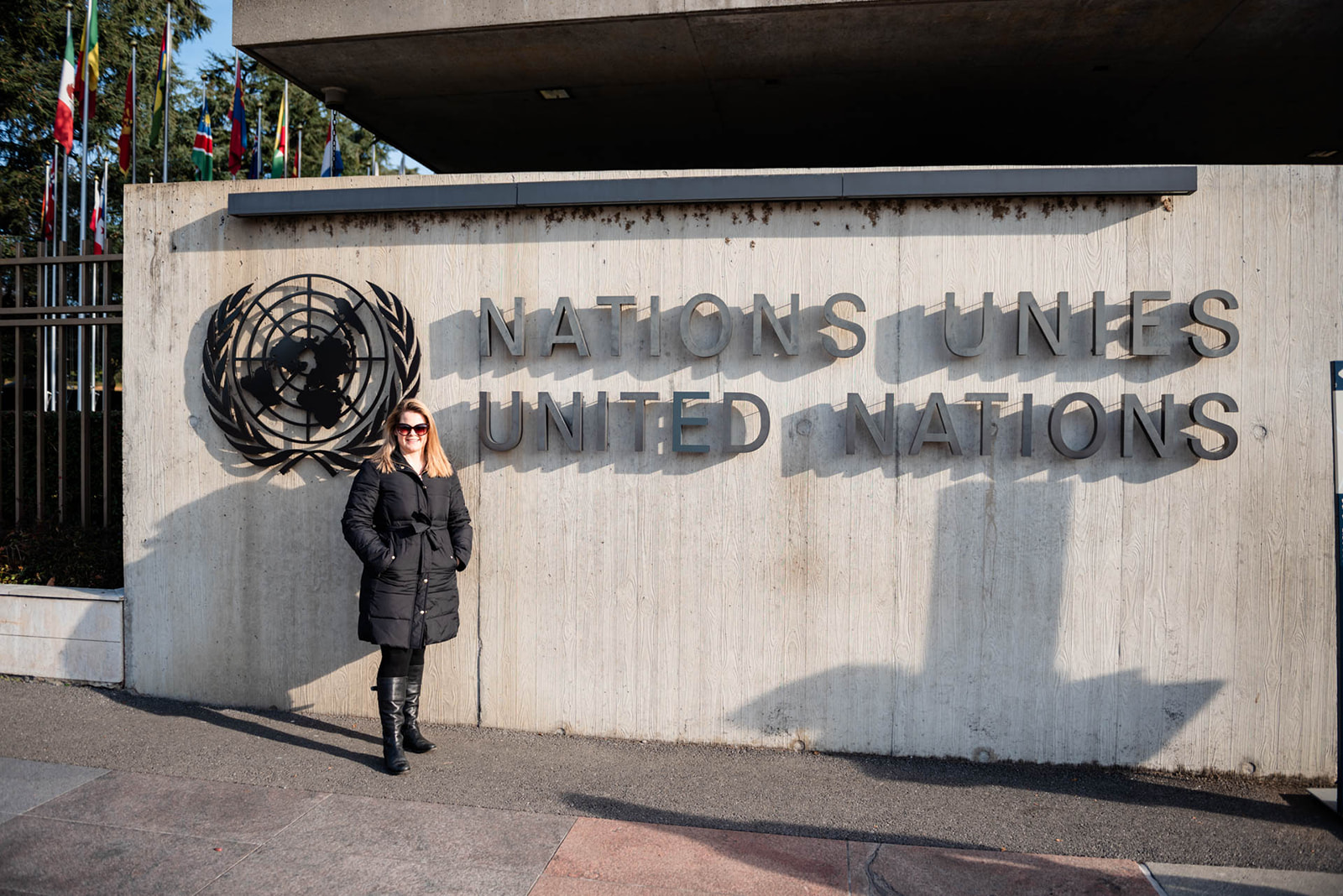 Expat woman by United Nations Headquarters Geneva Switzerland