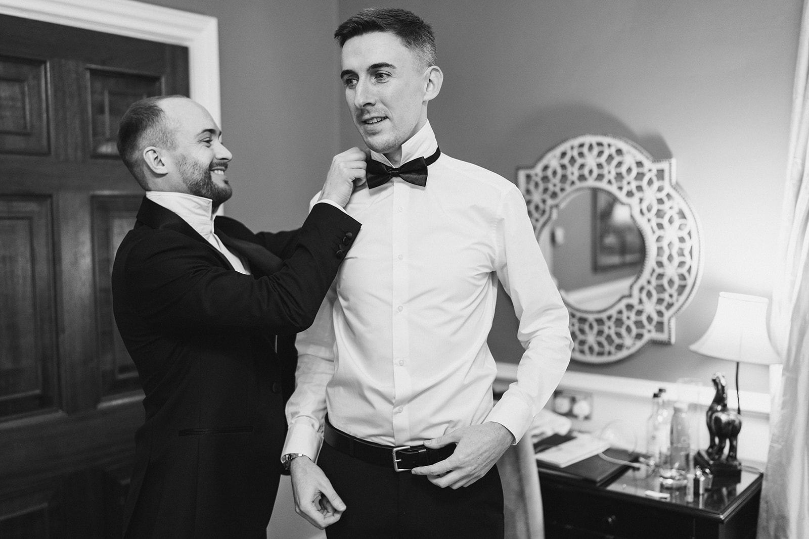 Groom getting ready at Rushton Hall with his Groomsmen