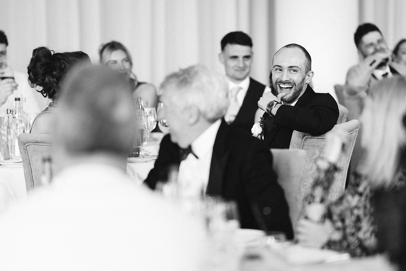 guests reacting to the grooms wedding speech