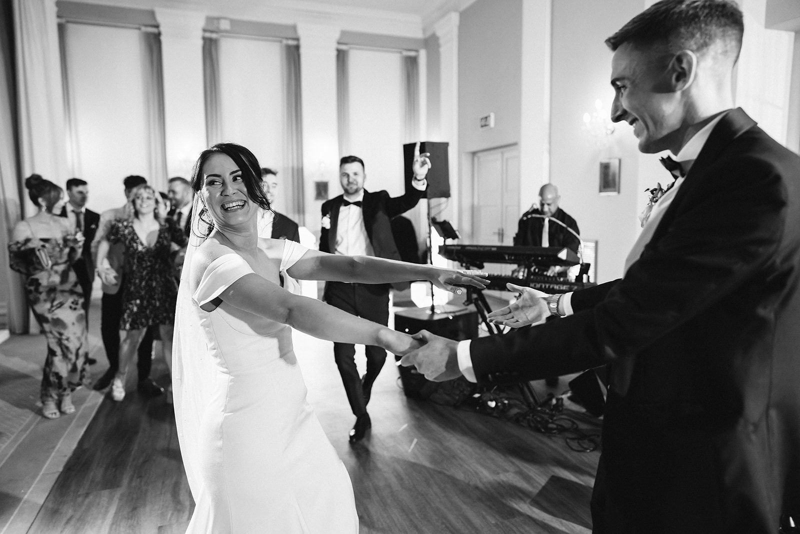 bride and groom dance during their wedding first dance at Rushton Hall