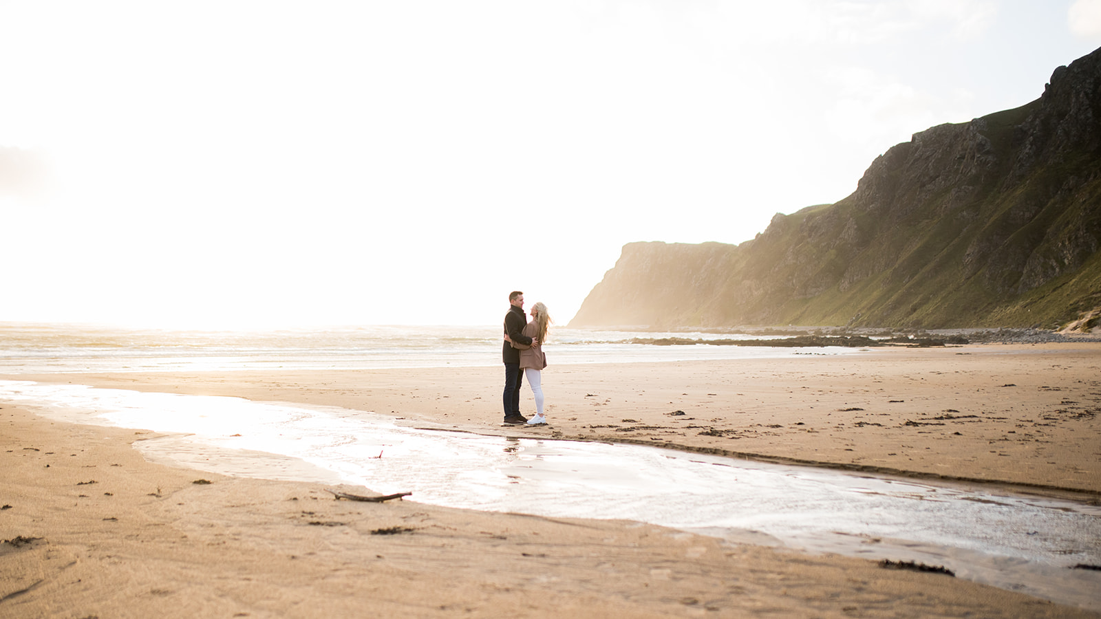 Couple on Lagg Beach during Sunset